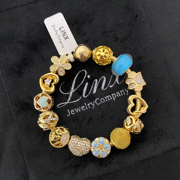 Linx Yellow Gold Bracelet with Gold and Baby Blue Themed Charms
